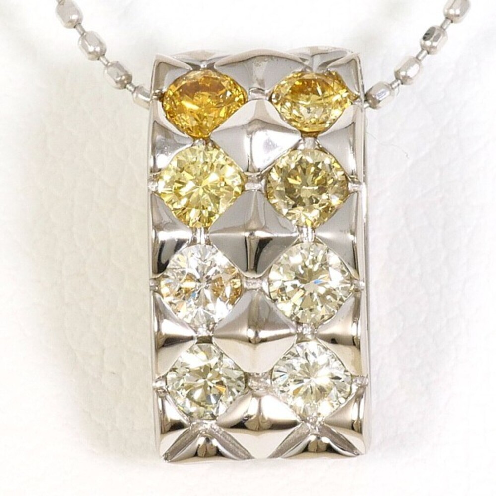18K (18-karat white gold) necklace with yellow diamonds and other (total 0.53...